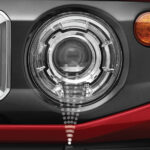 Manual leveling LED projector headlamp with washer